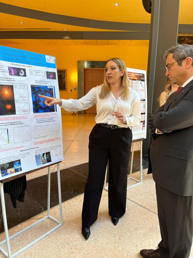 S.E. l’Ambasciatore Marco Peronaci assiste a una presentazione da parte della Dott.ssa Cerimi, ricercatrice post-dottorato e partecipante